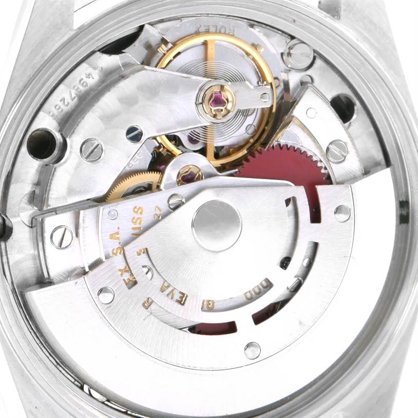 The image shows a close-up of the movement mechanism of a Rolex Air-King 14010 Men's Stainless Steel Black Dial 14010 Men's Stainless Steel Black Dial model watch.