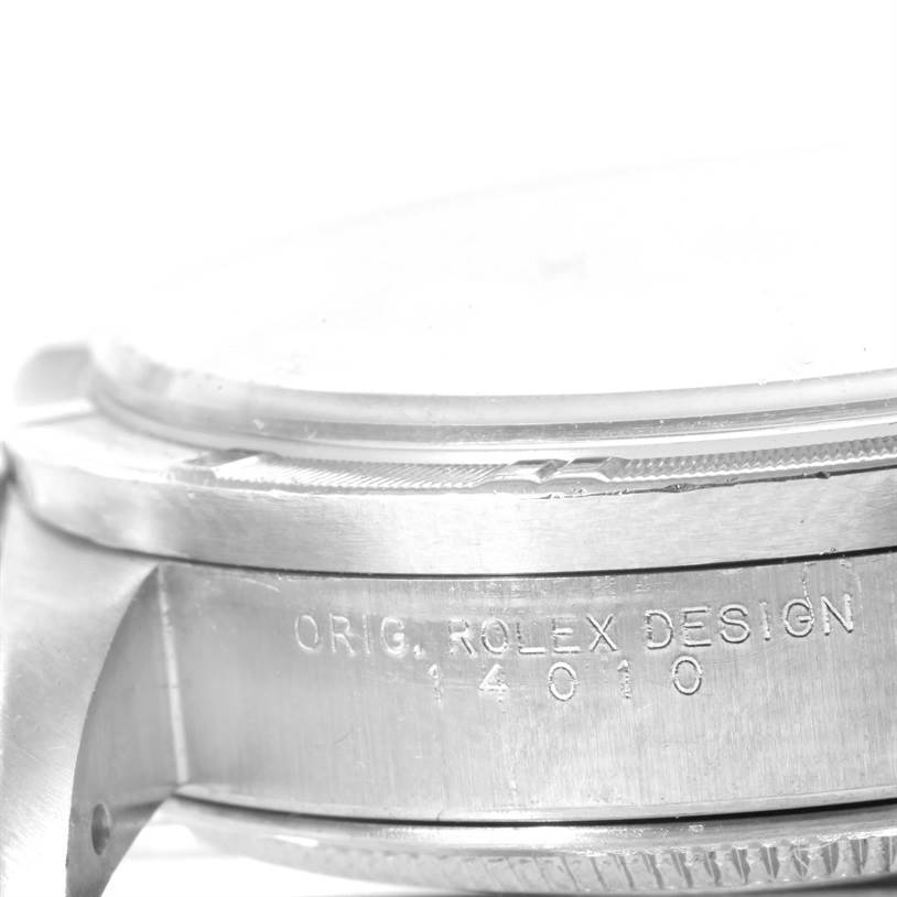 The image shows a side angle close-up of the casing and bezel of a Rolex Air-King 14010 Men's Stainless Steel Black Dial 14010 Men's Stainless Steel Black Dial watch, highlighting the "Orig. Rolex Design" engraving.