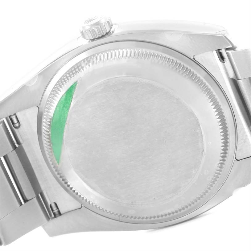 This is a close-up of the caseback and crown of the Rolex Air-King 114200 Men's Stainless Steel Silver Dial 114200 Men's Stainless Steel Silver Dial watch.