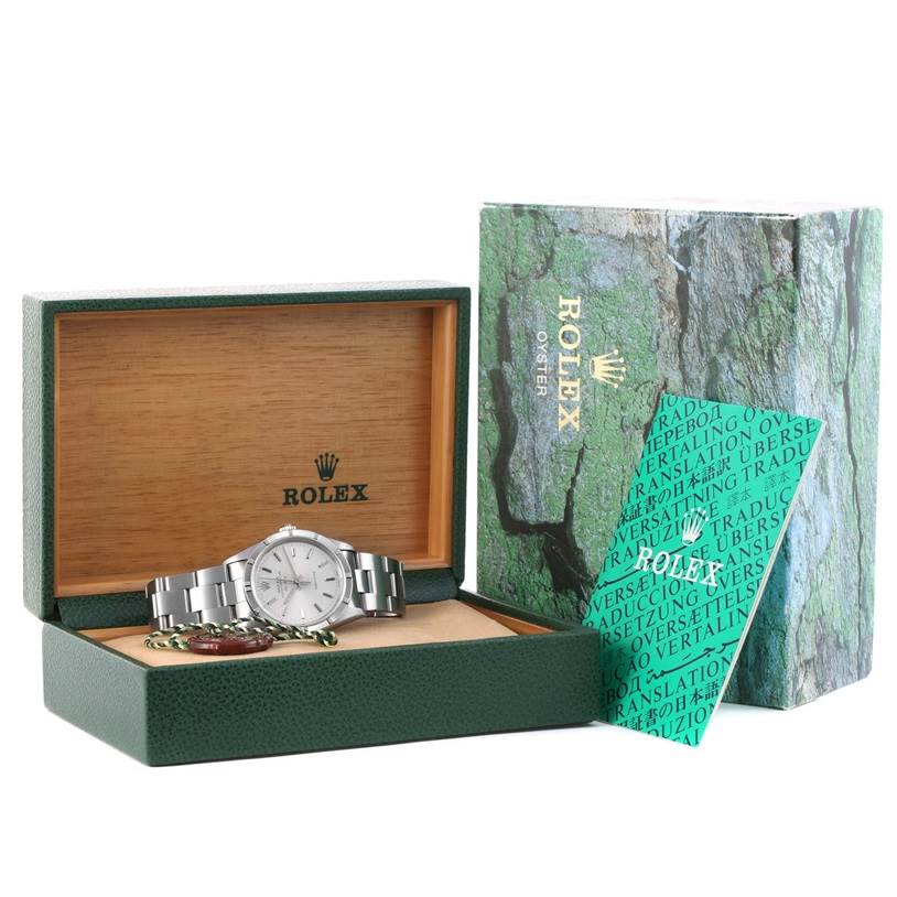 The image shows a Rolex Air-King 14010 Men's Stainless Steel Silver Dial 14010 Men's Stainless Steel Silver Dial watch placed inside its green and wooden presentation box, with the outer packaging and tags visible.