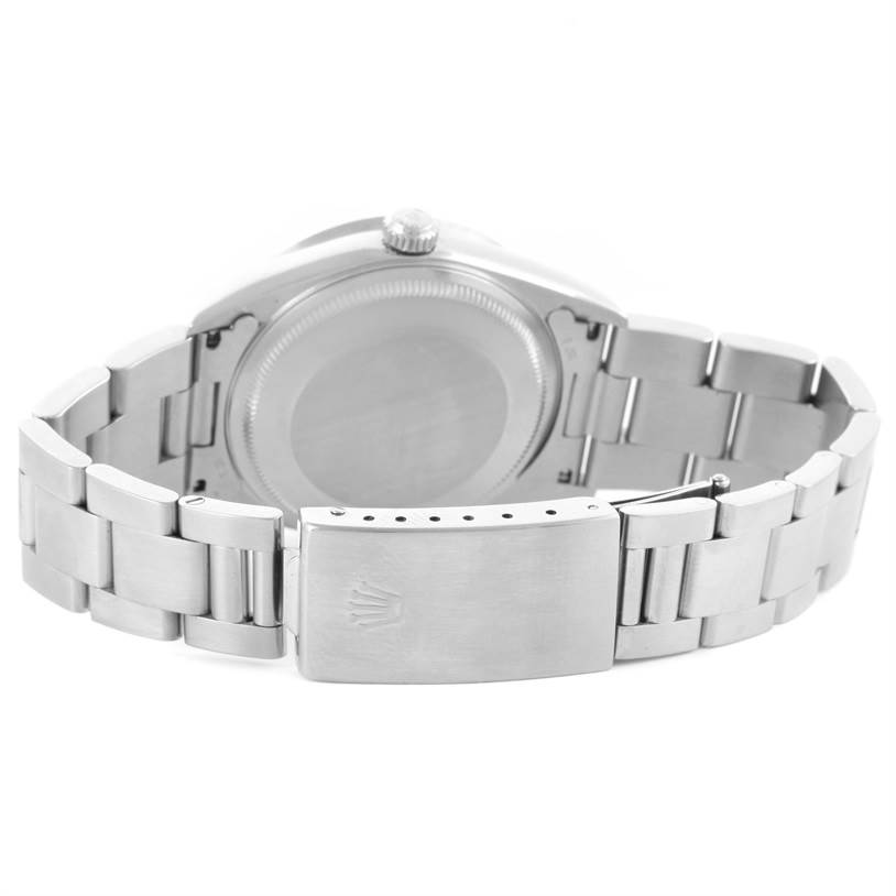 The image shows the back and clasp of a Rolex Air-King 14010 Men's Stainless Steel Silver Dial 14010 Men's Stainless Steel Silver Dial watch, highlighting its stainless steel bracelet.
