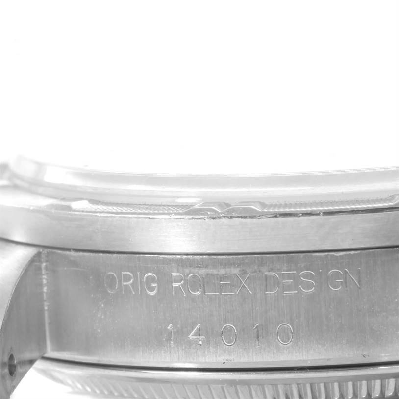 The image shows a side angle of the Rolex Air-King 14010 Men's Stainless Steel Silver Dial 14010 Men's Stainless Steel Silver Dial watch's case, detailing the engraved text and model number "14010."