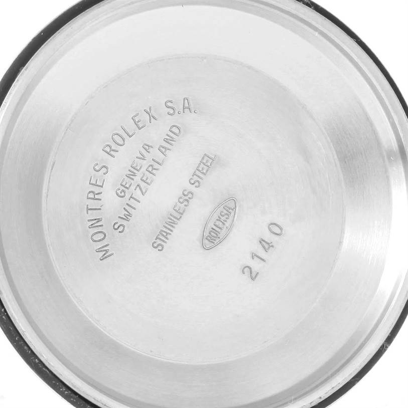 This image shows the inside of the case back of a Rolex Air-King 14010 Men's Stainless Steel Black Dial 14010 Men's Stainless Steel Black Dial watch, detailing inscriptions and model information.