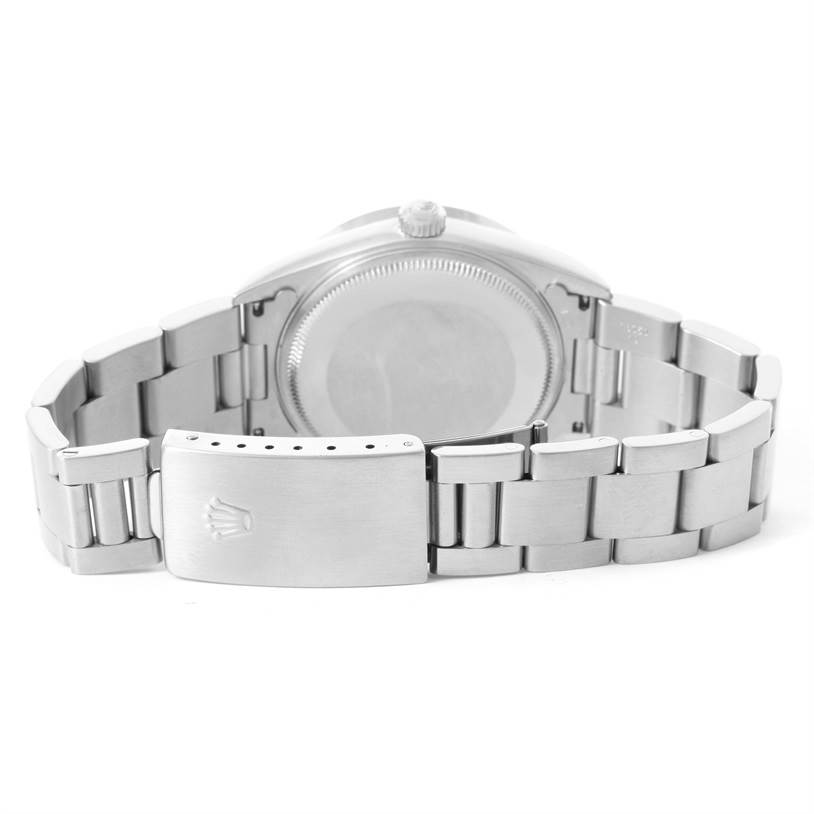 The image shows the back of the Rolex Air-King 14010 Men's Stainless Steel Black Dial 14010 Men's Stainless Steel Black Dial watch, focusing on the clasp and bracelet.