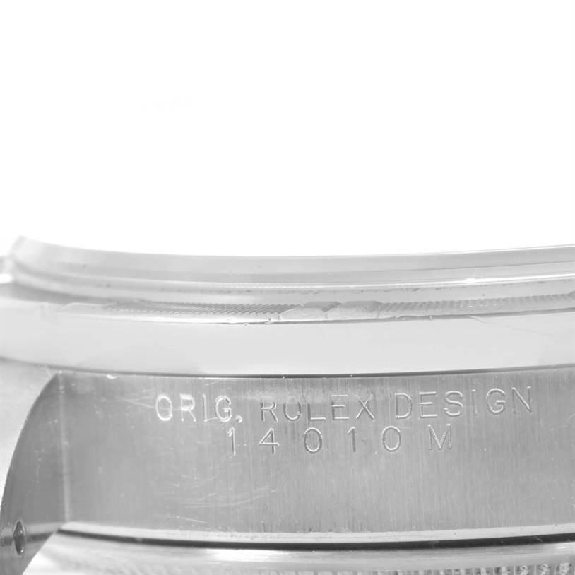 The image shows a close-up angle of the Air-King model by Rolex with the engraving "ORIG. ROLEX DESIGN 14010M".