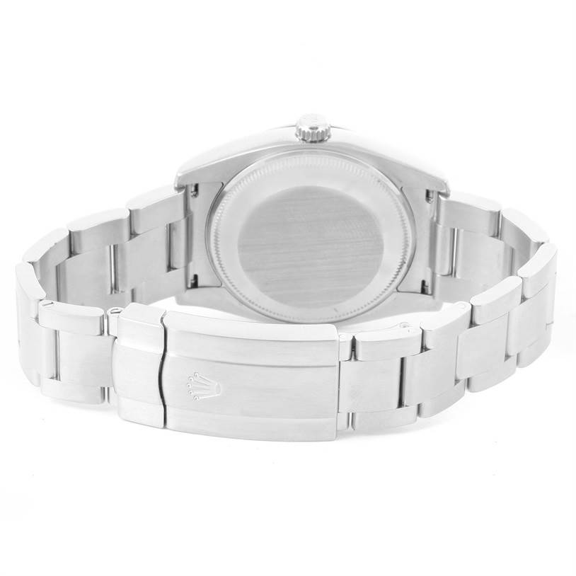 This image shows the back view of a Rolex Air-King 114234 Men's Stainless Steel Silver Dial 114234 Men's Stainless Steel Silver Dial watch, highlighting the case back and bracelet with the clasp containing the Rolex logo.