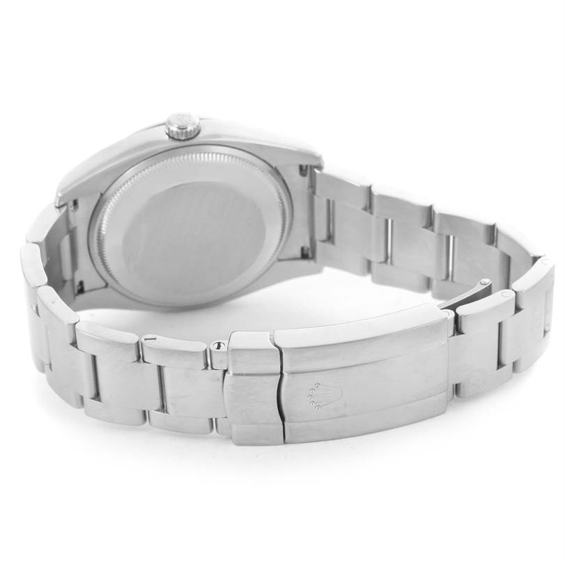 The image shows the back and clasp of a Rolex Air-King 114200 Men's Stainless Steel White Dial 114200 Men's Stainless Steel White Dial watch at an angle that highlights the bracelet and case back.
