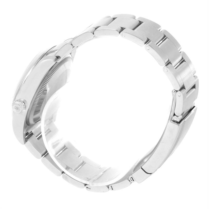 The image shows a side view of a Rolex Air-King 114200BLASO Men's Stainless Steel Blue Dial 114200BLASO Men's Stainless Steel Blue Dial watch, highlighting its bracelet and crown.