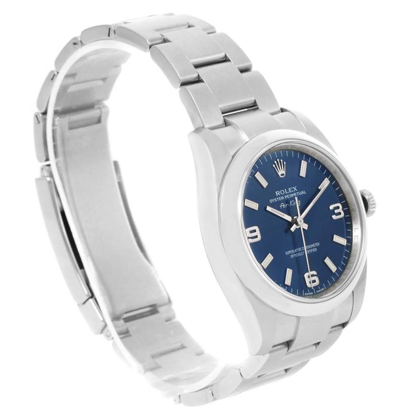 The image shows a Rolex Air-King 114200BLASO Men's Stainless Steel Blue Dial 114200BLASO Men's Stainless Steel Blue Dial watch at an angled side view, highlighting the strap, case, and blue dial.