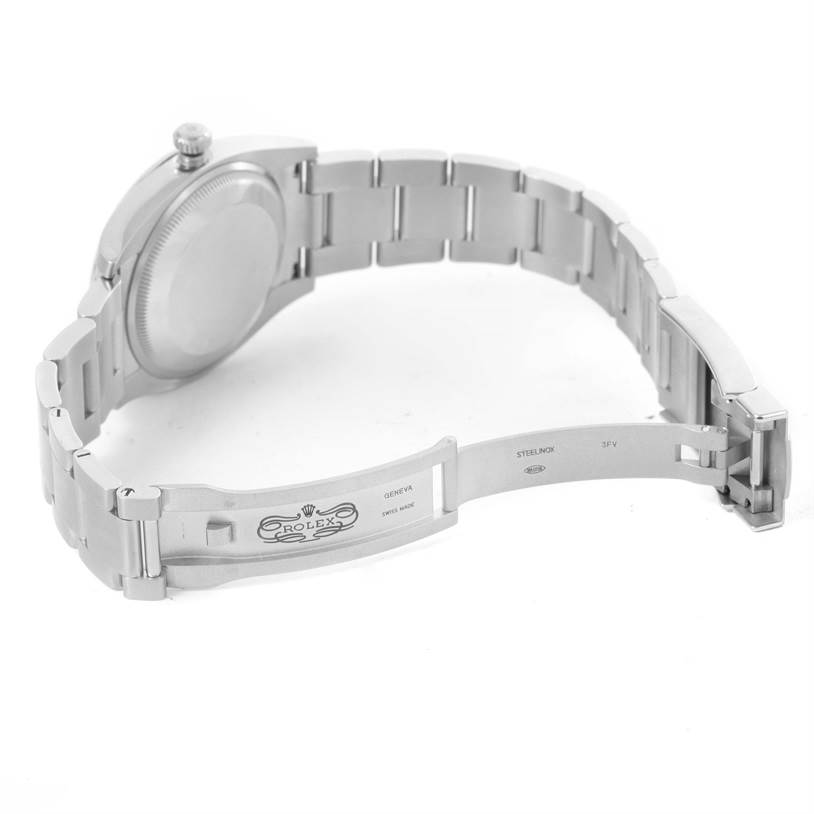 The image shows the underside and side profile of a Rolex Air-King 114200BLASO Men's Stainless Steel Blue Dial 114200BLASO Men's Stainless Steel Blue Dial watch, highlighting the open clasp and bracelet links.