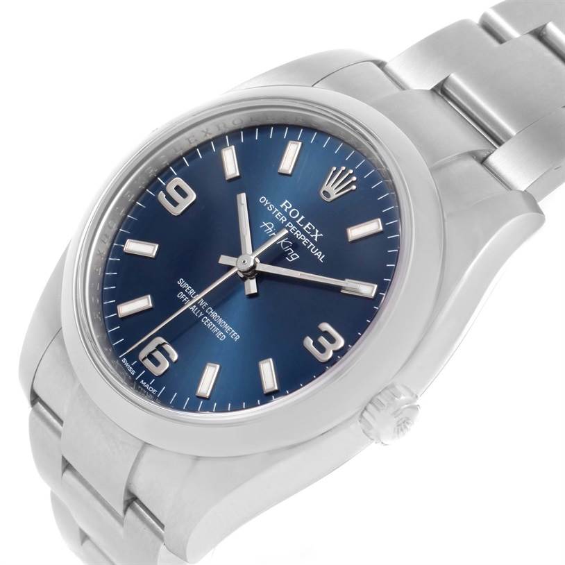 The image shows a Rolex Air-King 114200BLASO Men's Stainless Steel Blue Dial 114200BLASO Men's Stainless Steel Blue Dial watch at an angle highlighting the face, crown, and part of the bracelet.