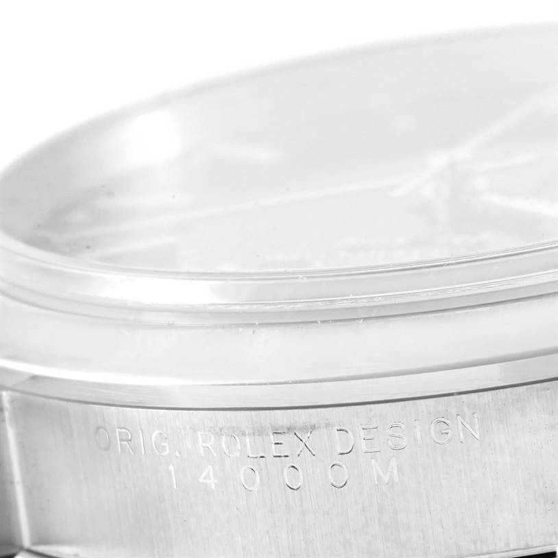 This image shows a close-up of the side casing of a Rolex Air-King 14000 Men's Stainless Steel Black Dial 14000 Men's Stainless Steel Black Dial watch with model number 14000M, highlighting the engraved design.