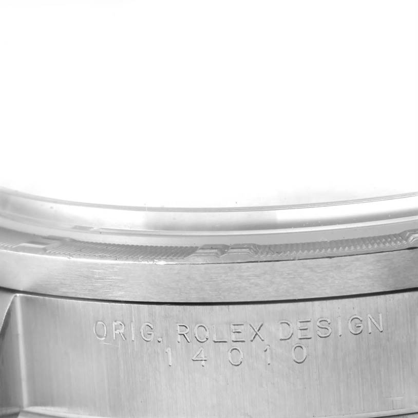 The image shows a close-up of the side of the case and bezel of a Rolex Air-King 14010 Men's Stainless Steel Blue Dial 14010 Men's Stainless Steel Blue Dial with the model number 14010 engraved.