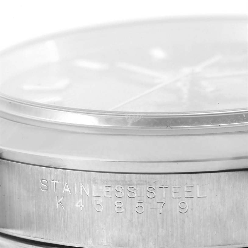 This image shows a close-up of the case side of a Rolex Air-King 14000 Men's Stainless Steel Blue Dial 14000 Men's Stainless Steel Blue Dial watch, highlighting the model's serial number engraved on the stainless steel.