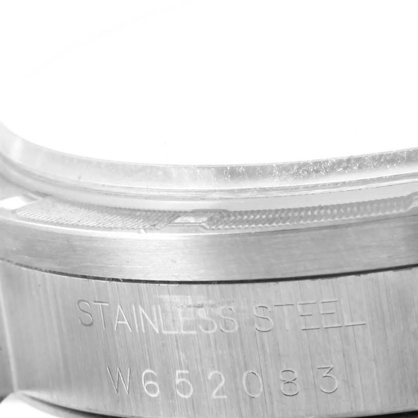 The close-up image shows the side of a Rolex Air-King 14010 Men's Stainless Steel Black Dial 14010 Men's Stainless Steel Black Dial watch case, highlighting the stainless steel material and serial number.