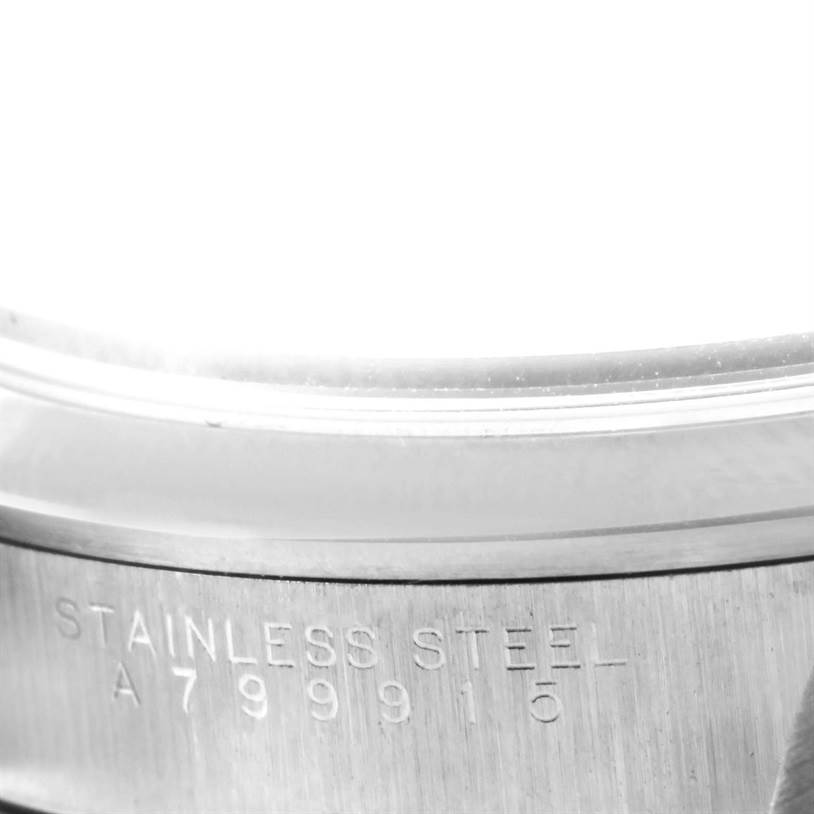 The image shows a close-up of the stainless steel casing with an engraved serial number on the Rolex Air-King 14000 Men's Stainless Steel Blue Dial 14000 Men's Stainless Steel Blue Dial watch.