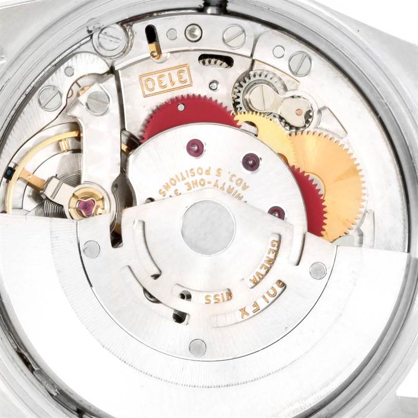 This is a close-up shot of the inner mechanical components of a Rolex Air-King 14000 Men's Stainless Steel Black Dial 14000 Men's Stainless Steel Black Dial watch, showing gears and intricate details.