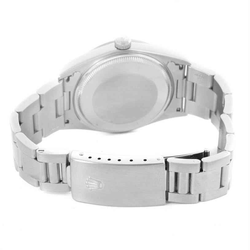 This image shows the back of the Rolex Air-King 14000 Men's Stainless Steel Black Dial 14000 Men's Stainless Steel Black Dial watch, highlighting its clasp, bracelet, caseback, and crown.