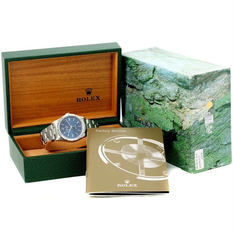 The image shows a Rolex Air-King 14010 Men's Stainless Steel Blue Dial 14010 Men's Stainless Steel Blue Dial watch, open green Rolex box, green outer box, and a Factory Service booklet from a frontal angle.