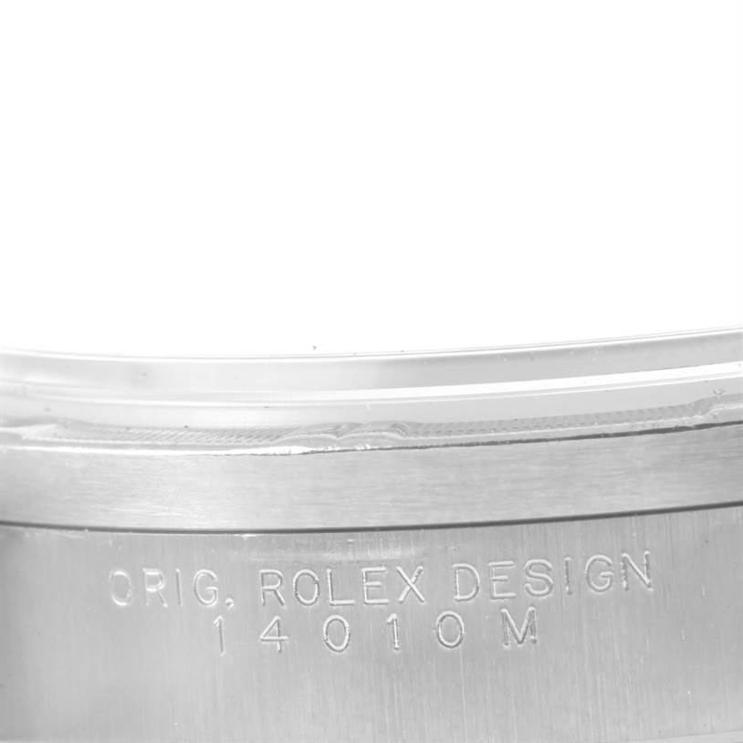 This image shows a close-up angle of the case back with the inscription on the Rolex Air-King 14010 Men's Stainless Steel Blue Dial 14010 Men's Stainless Steel Blue Dial model.