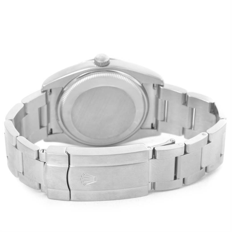 The image shows the back view of a Rolex Air-King 114200 Men's Stainless Steel Silver Dial 114200 Men's Stainless Steel Silver Dial watch, focusing on the case back and the bracelet with the clasp.
