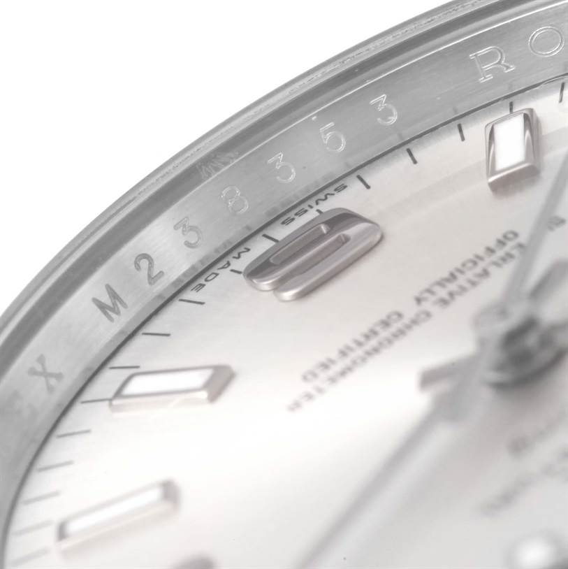 The image shows a close-up of the dial and bezel of a Rolex Air-King 114200 Men's Stainless Steel Silver Dial 114200 Men's Stainless Steel Silver Dial watch, highlighting the hour markers and text on the face.