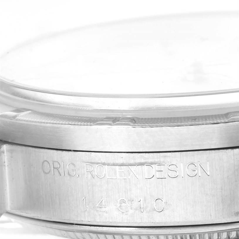 The image shows a close-up side view of the case and bezel of a Rolex Air-King 14010 Men's Stainless Steel Silver Dial 14010 Men's Stainless Steel Silver Dial watch, highlighting the engraved text.