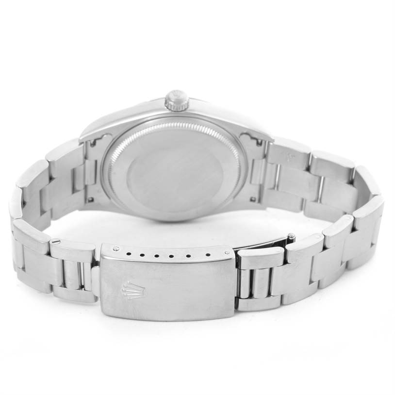 This image shows the back view of the Rolex Air-King 14000 Men's Stainless Steel White Dial 14000 Men's Stainless Steel White Dial watch, highlighting the case back, crown, and bracelet with clasp.