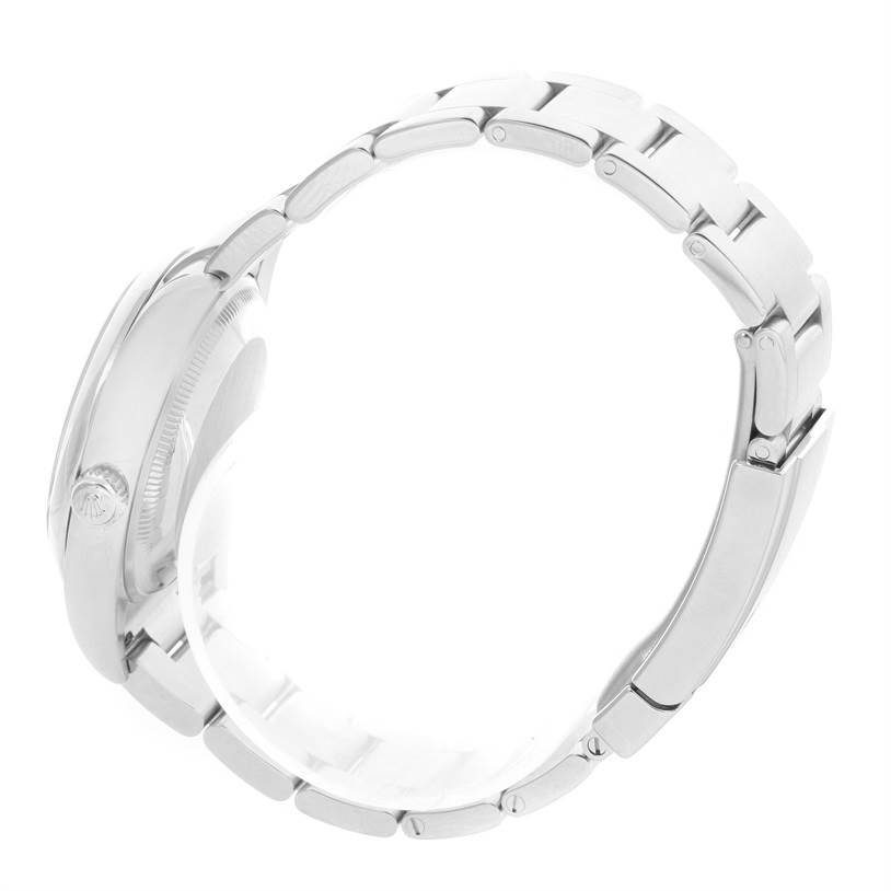 This side view of the Rolex Air-King 114200 Men's Stainless Steel Silver Dial 114200 Men's Stainless Steel Silver Dial watch shows the bracelet, case, and crown.