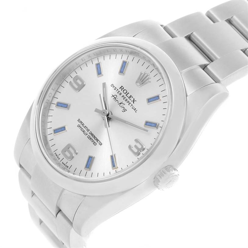 The image shows a Rolex Air-King 114200 Men's Stainless Steel Silver Dial 114200 Men's Stainless Steel Silver Dial watch at a slightly tilted angle, highlighting its face, bezel, crown, and part of the bracelet.