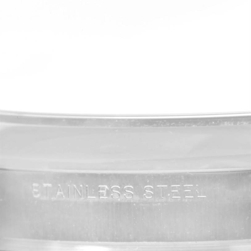 The image shows a close-up of the stainless steel case back of a Rolex Air-King 114200 Men's Stainless Steel Silver Dial 114200 Men's Stainless Steel Silver Dial watch.