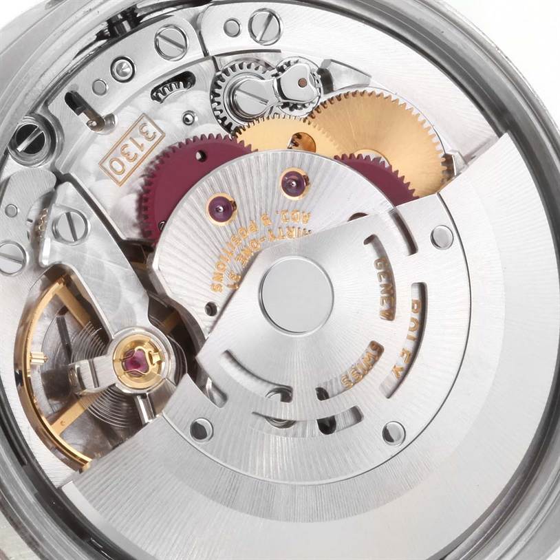 This image shows the internal mechanical movement of the Rolex Air-King 114200 Men's Stainless Steel Grey Dial 114200 Men's Stainless Steel Grey Dial watch viewed from the backside.