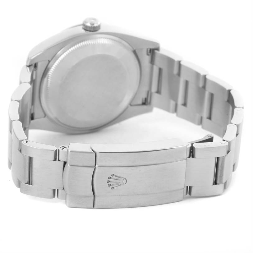 The image shows the back case and bracelet clasp of a Rolex Air-King 114200 Men's Stainless Steel Grey Dial 114200 Men's Stainless Steel Grey Dial watch from a rear angle.