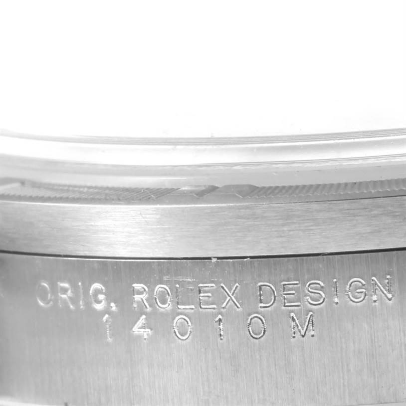 This is a close-up angle showing the case side and engraved text of the Rolex Air-King 14010 Men's Stainless Steel Blue Dial 14010 Men's Stainless Steel Blue Dial watch.