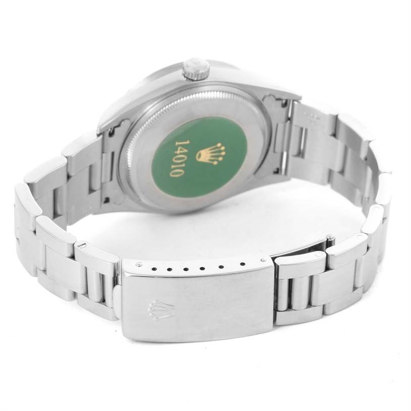 This image shows the back case, crown, and bracelet clasp of a Rolex Air-King 14010 Men's Stainless Steel Blue Dial 14010 Men's Stainless Steel Blue Dial watch from a rear angle.