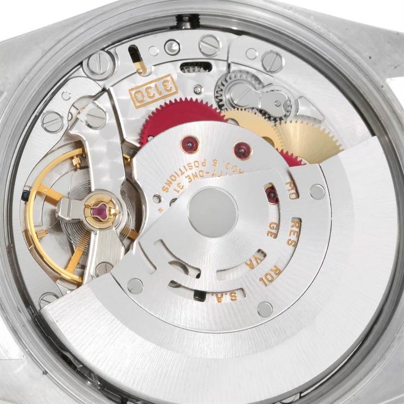 This image shows the intricate inner mechanism of the Rolex Air-King 14010 Men's Stainless Steel Blue Dial 14010 Men's Stainless Steel Blue Dial watch from a top-down angle.