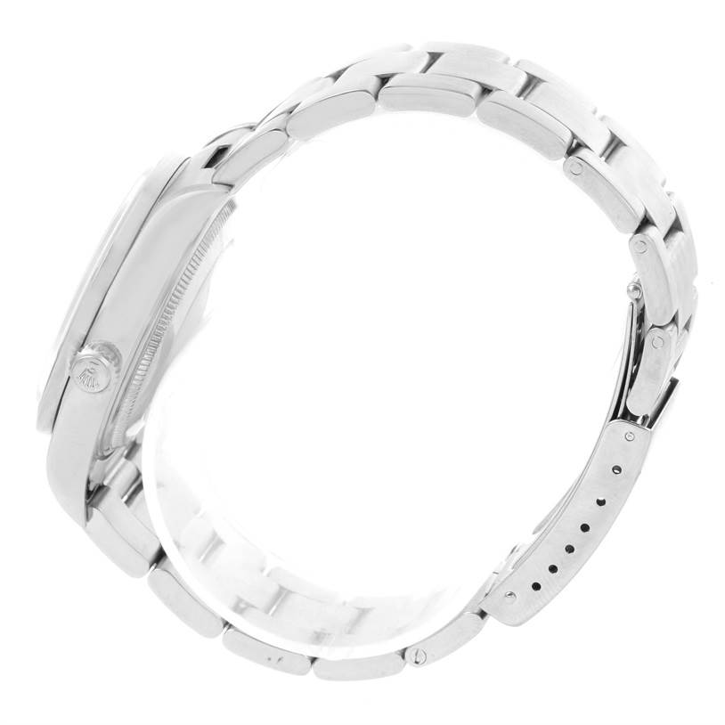 The image shows a side view of a Rolex Air-King 14010 Men's Stainless Steel Silver Dial 14010 Men's Stainless Steel Silver Dial watch, emphasizing its crown, case, and stainless steel bracelet.