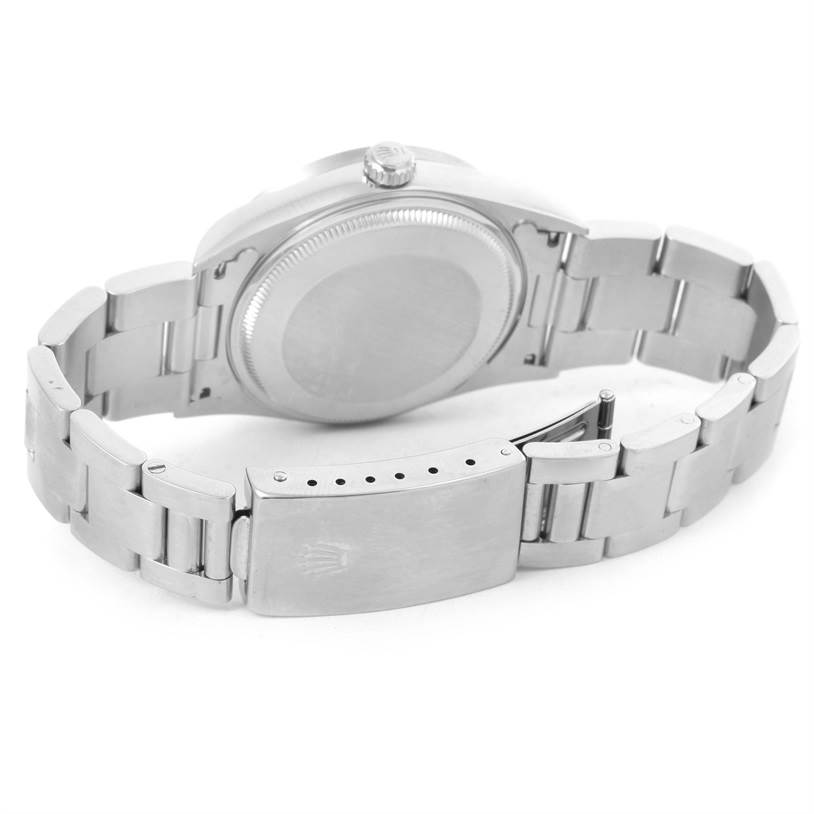 This image shows the back case and bracelet clasp of a Rolex Air-King 14010 Men's Stainless Steel Silver Dial 14010 Men's Stainless Steel Silver Dial watch from a rear angle.