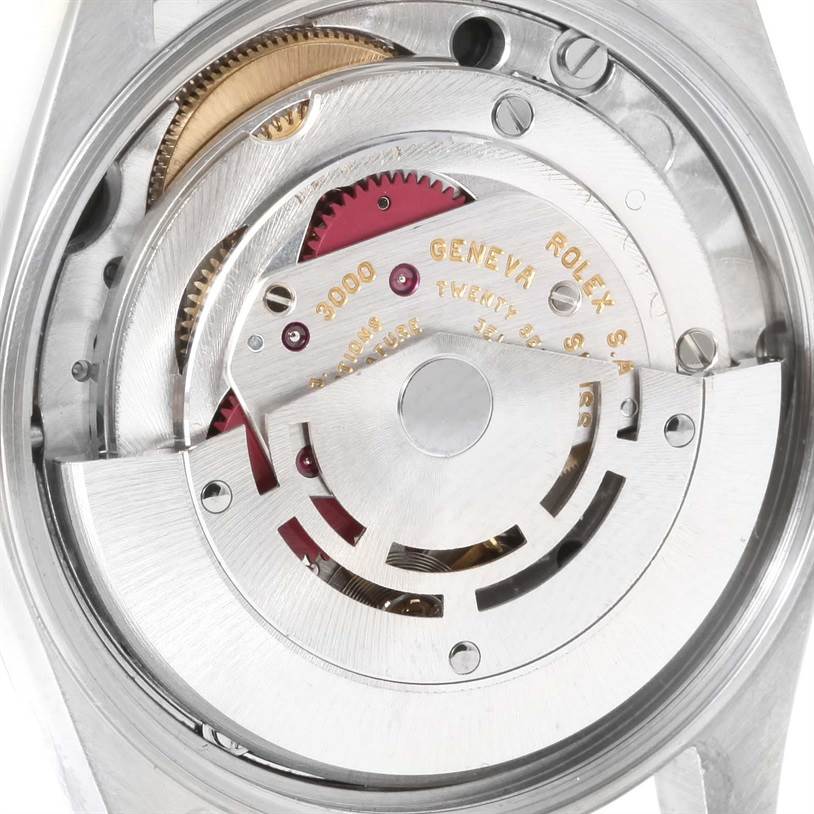 The image shows the Rolex Air-King 14010 Men's Stainless Steel Black Dial 14010 Men's Stainless Steel Black Dial's movement, specifically the rotor and internal gearing mechanisms.