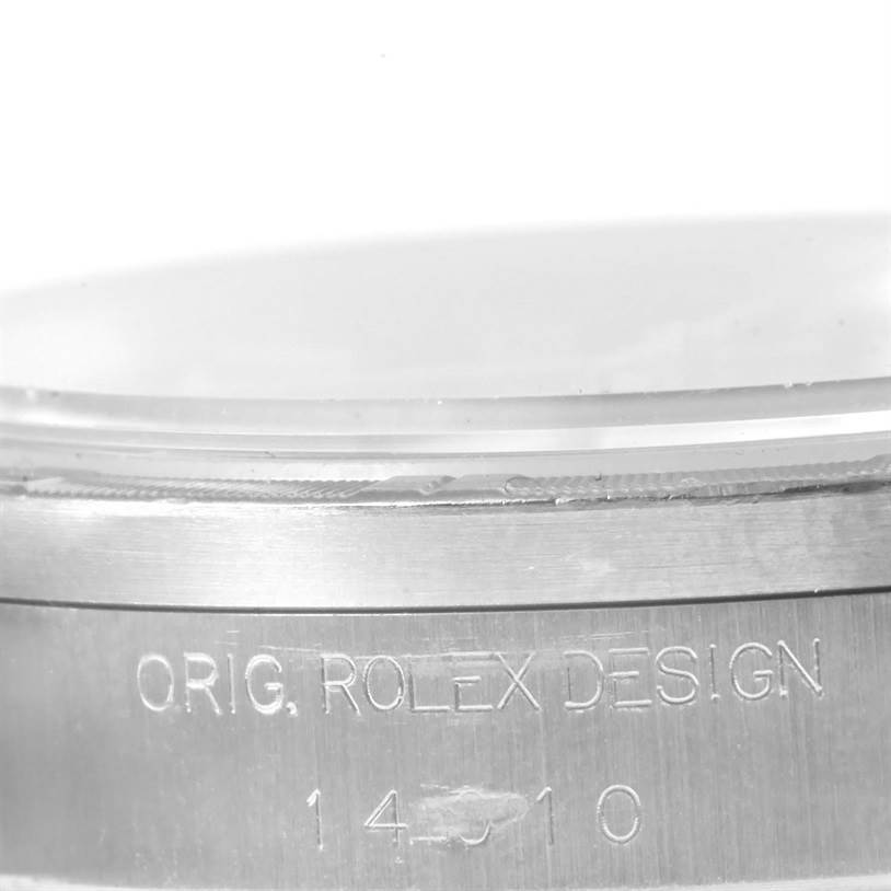 The image shows a close-up of the Rolex Air-King 14010 Men's Stainless Steel Black Dial 14010 Men's Stainless Steel Black Dial watch case, highlighting the engraved "ORIG. ROLEX DESIGN" and model number 14010.