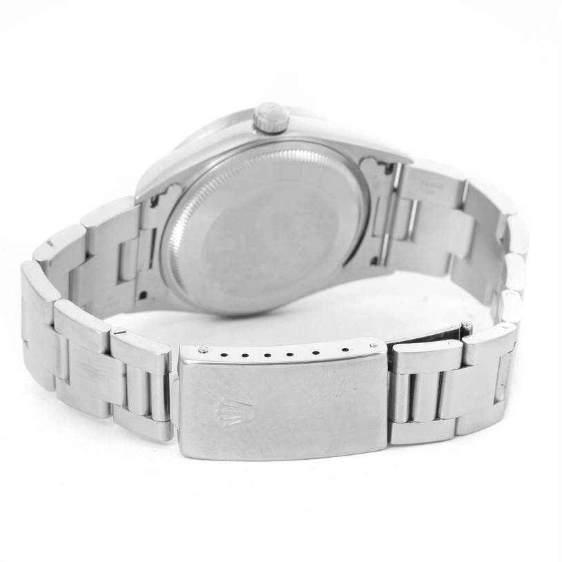 This image shows the back of the Rolex Air-King 14010 Men's Stainless Steel Black Dial 14010 Men's Stainless Steel Black Dial watch, highlighting its clasp, bracelet, and case back from an angled rear view.