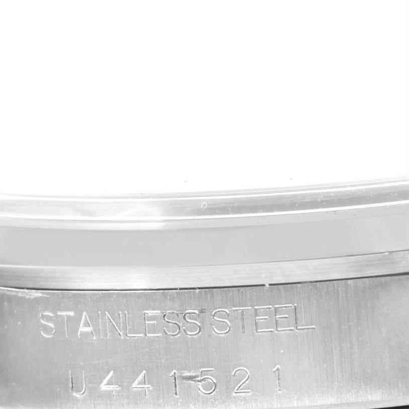 This image shows the side back angle of a Rolex Air-King 14000 Men's Stainless Steel Blue Dial 14000 Men's Stainless Steel Blue Dial watch, highlighting its stainless steel composition and serial number.