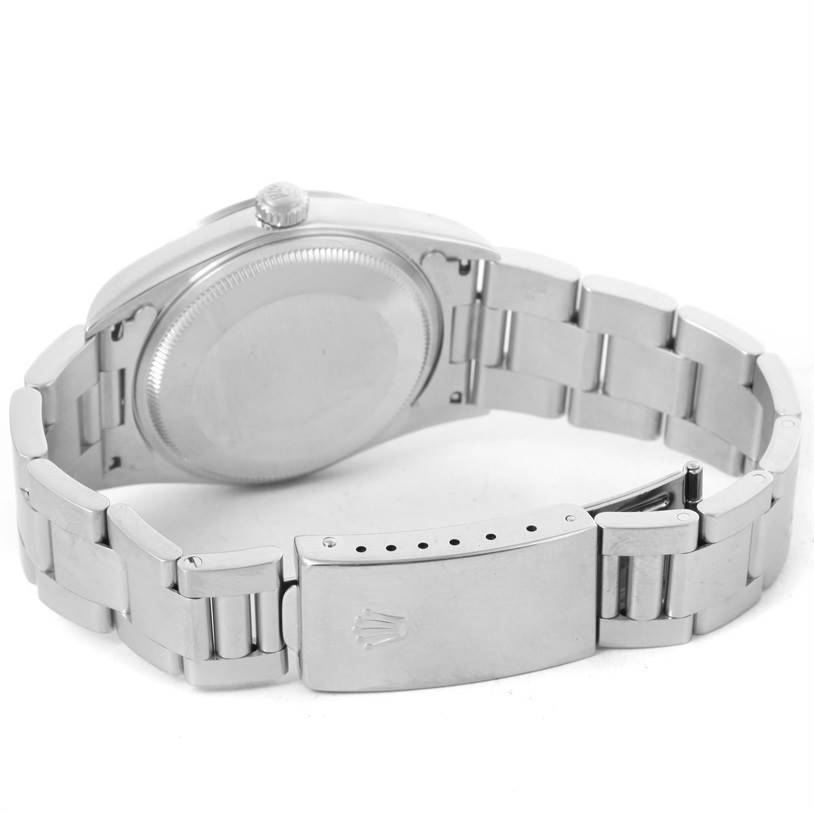 This image shows the back view of a Rolex Air-King 14000 Men's Stainless Steel Blue Dial 14000 Men's Stainless Steel Blue Dial watch, focusing on its case, bracelet links, and clasp.