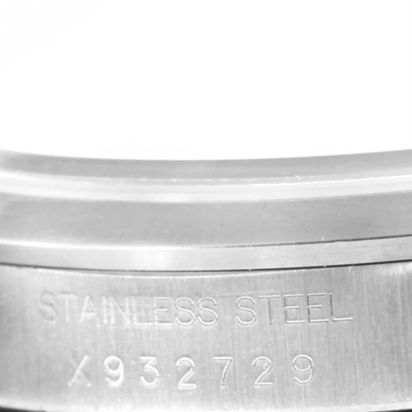 This image shows a close-up of the serial and material engraving on the stainless steel part of a Rolex Air-King 14000 Men's Stainless Steel Pink Dial 14000 Men's Stainless Steel Pink Dial watch.