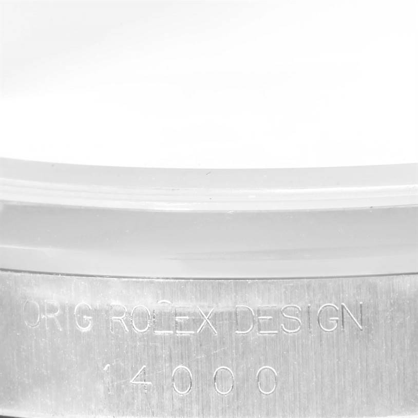 The image shows a close-up of the Rolex Air-King 14000 Men's Stainless Steel Pink Dial 14000 Men's Stainless Steel Pink Dial model's case side, featuring the engraved text "ORIG ROLEX DESIGN 14000."