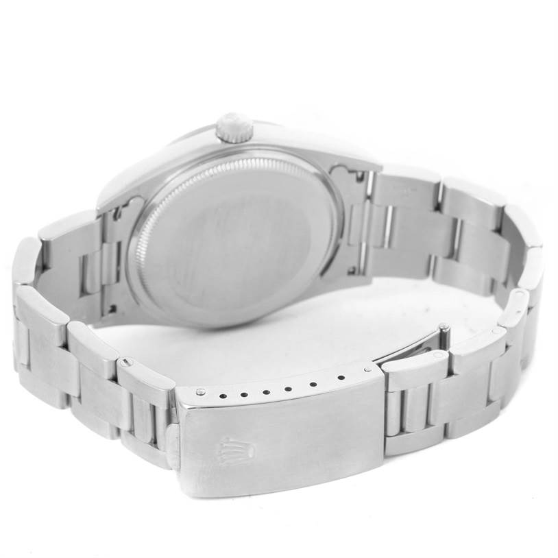 The image shows the back casing and the clasp of a Rolex Air-King 14000 Men's Stainless Steel Pink Dial 14000 Men's Stainless Steel Pink Dial watch from a rear angle.