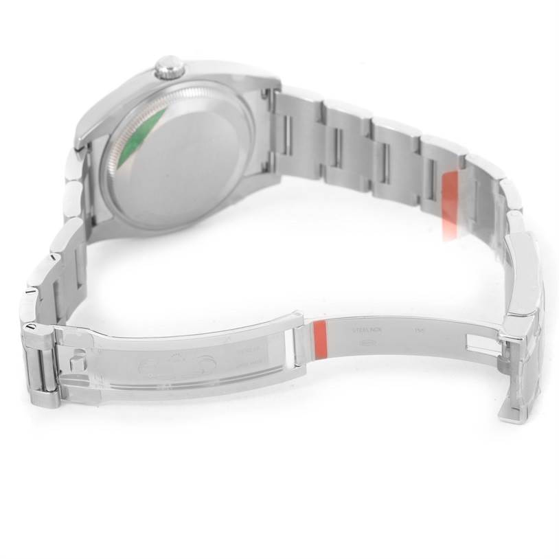 This image shows the Rolex Air-King 114200 Men's Stainless Steel Silver Dial 114200 Men's Stainless Steel Silver Dial watch from the back, highlighting the open clasp, bracelet, and case back.