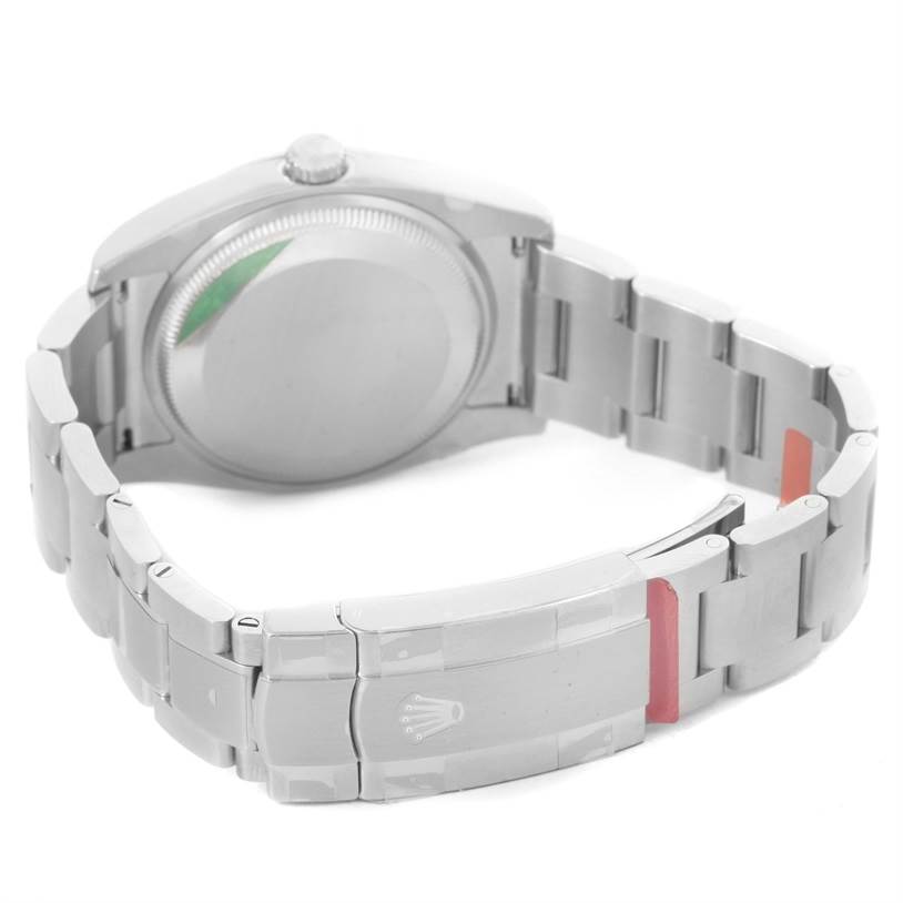 The image shows the back view of a Rolex Air-King 114200 Men's Stainless Steel Silver Dial 114200 Men's Stainless Steel Silver Dial watch, highlighting its case back, crown, and stainless steel bracelet with clasp.