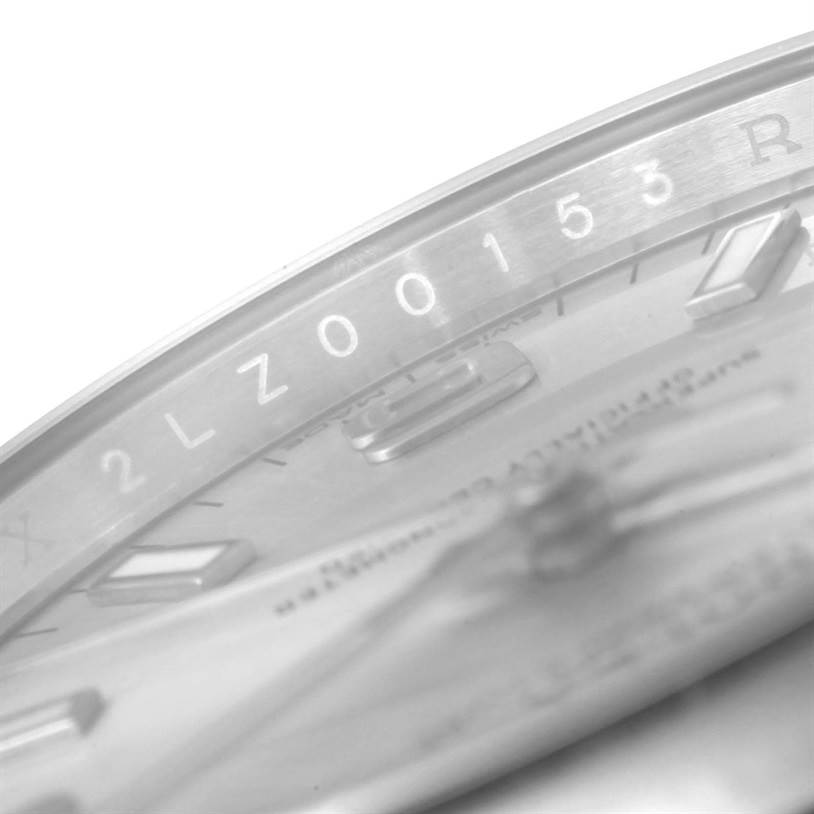 The image shows a close-up angle of the dial and the engraved bezel of the Rolex Air-King 114200 Men's Stainless Steel Silver Dial 114200 Men's Stainless Steel Silver Dial watch.
