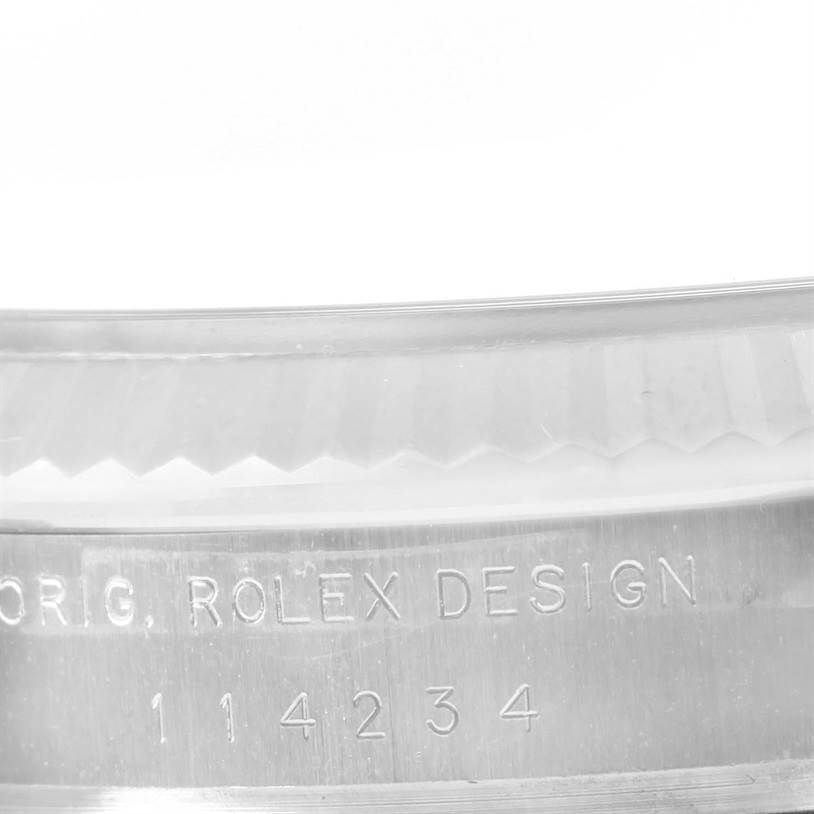 The image shows the side engraving on the casing of a Rolex Air-King 114234 Men's Stainless Steel White Dial 114234 Men's Stainless Steel White Dial watch, including the model number.